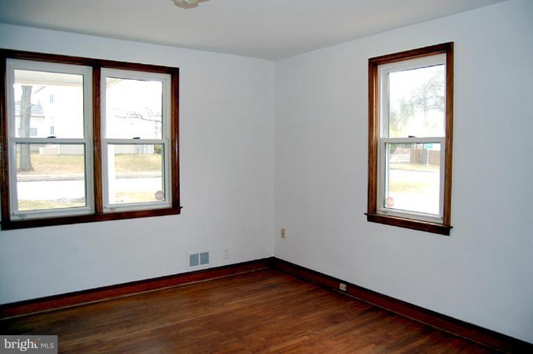 9430 North Laurel Road Laurel, MD 20723 - Photo 8 of 15 Living Room front windows