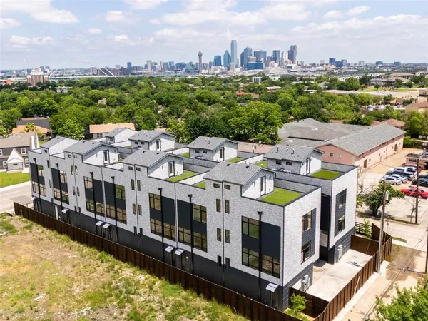 a view of city with tall buildings