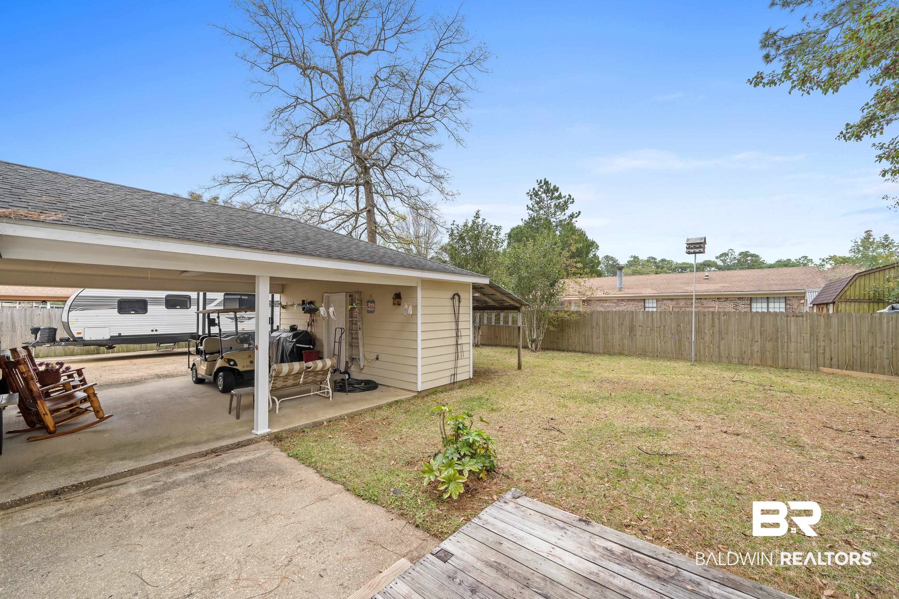 460 Ridgewood Drive Daphne, AL 36526 - Photo 24 of 31 View of yard with a patio