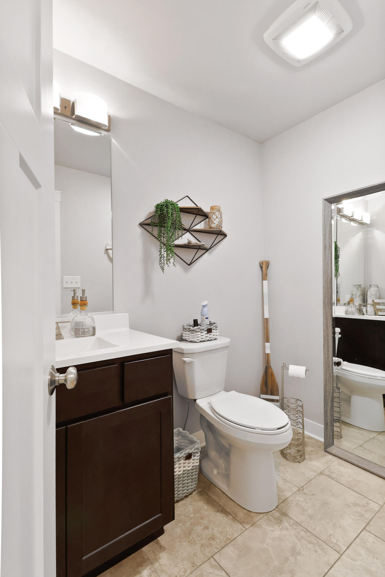 274 Westport Road Valparaiso, IN 46385 - Photo 13 of 28 a bathroom with a sink vanity mirror and toilet