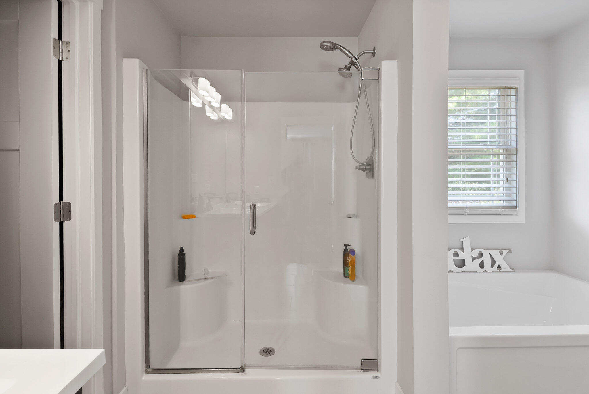 274 Westport Road Valparaiso, IN 46385 - Photo 16 of 28 a bathroom with a bathtub a shower a toilet and a sink