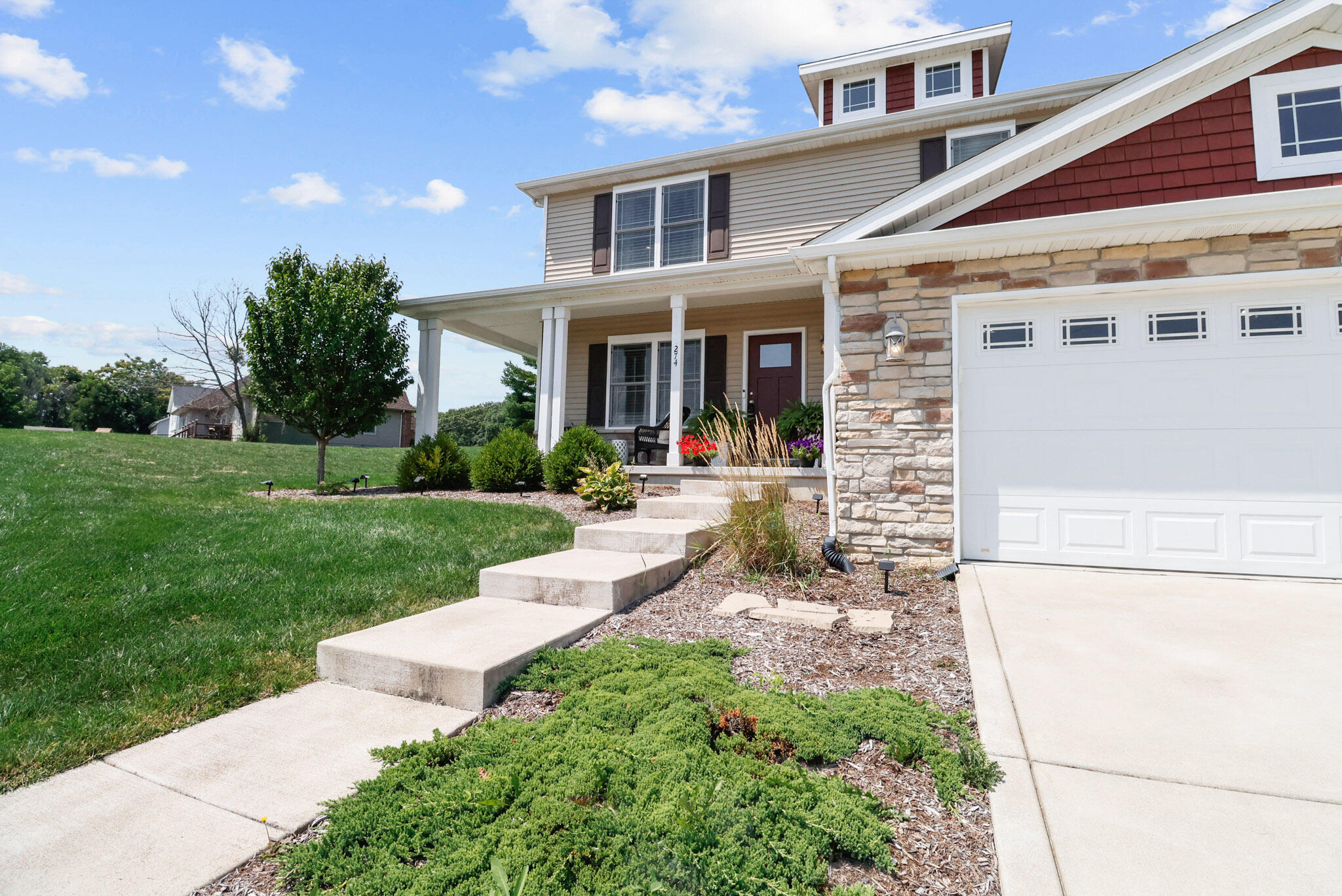 274 Westport Road Valparaiso, IN 46385 - Photo 2 of 28 a front view of a house with a yard