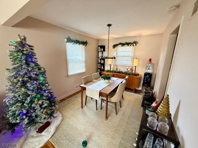 a workspace with furniture window and wooden floor
