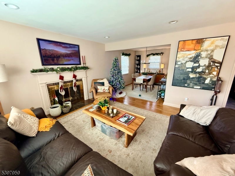 3 Arthur Road Bridgewater, NJ 08807 - Photo 2 of 7 a living room with furniture and a flat screen tv