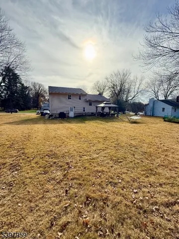 a view of a swimming pool and an outdoor seating