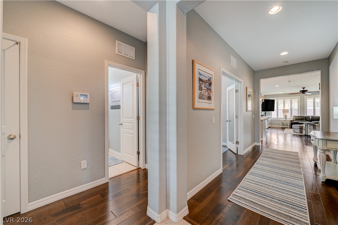 7049 Motley Road Las Vegas, NV 89178 - Photo 6 of 61 Gleaming hardwood floors guide you through the welcoming entryway.