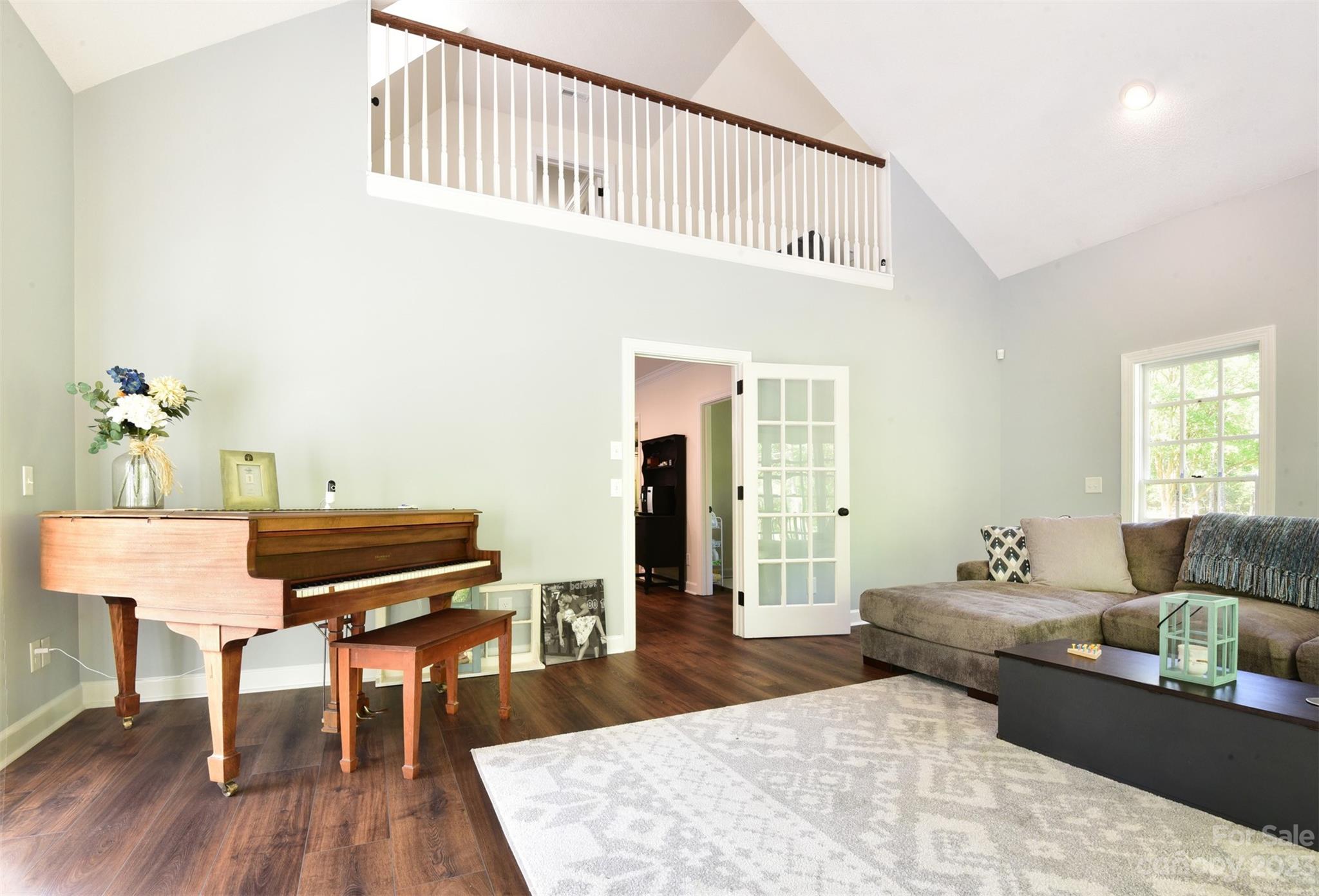 316 Biscoe Road Troy, NC 27371 - Photo 14 of 39 a living room with furniture and a wooden floor