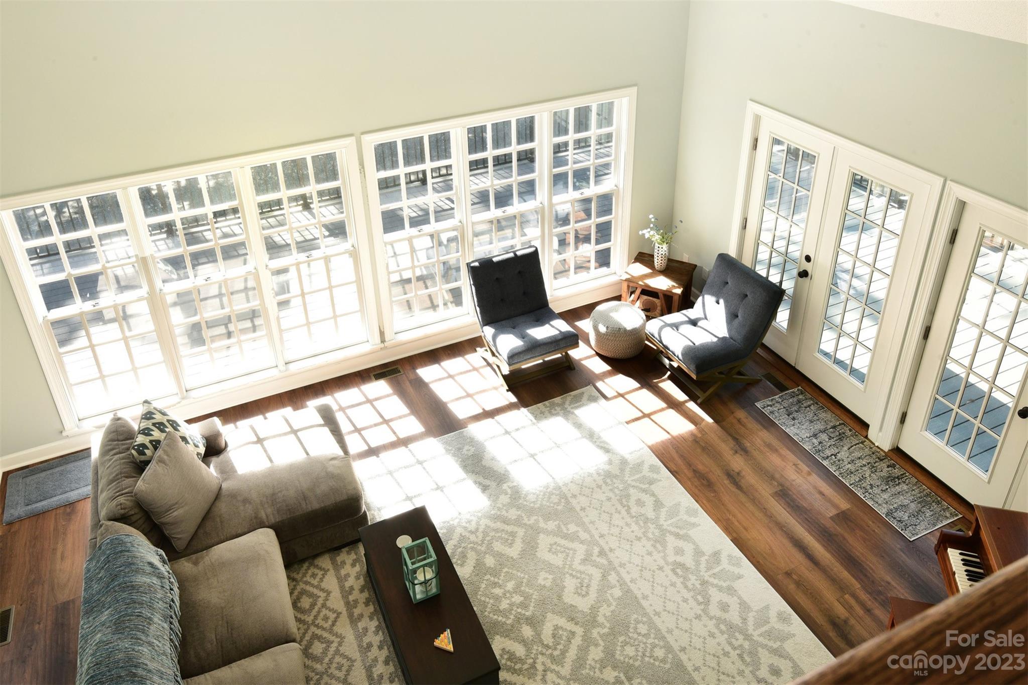 316 Biscoe Road Troy, NC 27371 - Photo 15 of 39 a living room with furniture and a flat screen tv
