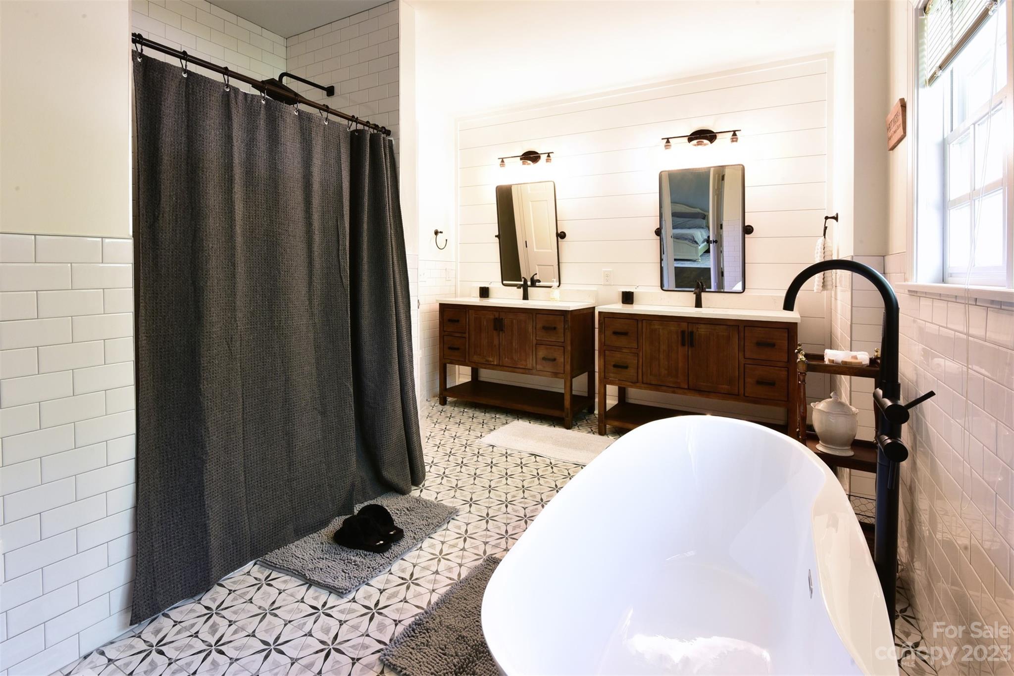 316 Biscoe Road Troy, NC 27371 - Photo 17 of 39 a bathroom with a sink and a mirror