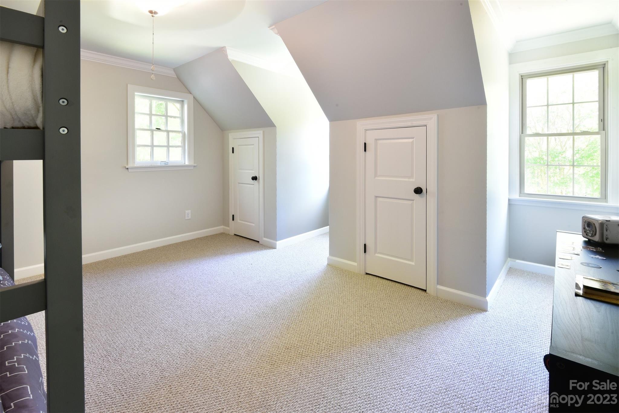 316 Biscoe Road Troy, NC 27371 - Photo 31 of 39 an empty room with windows and closet