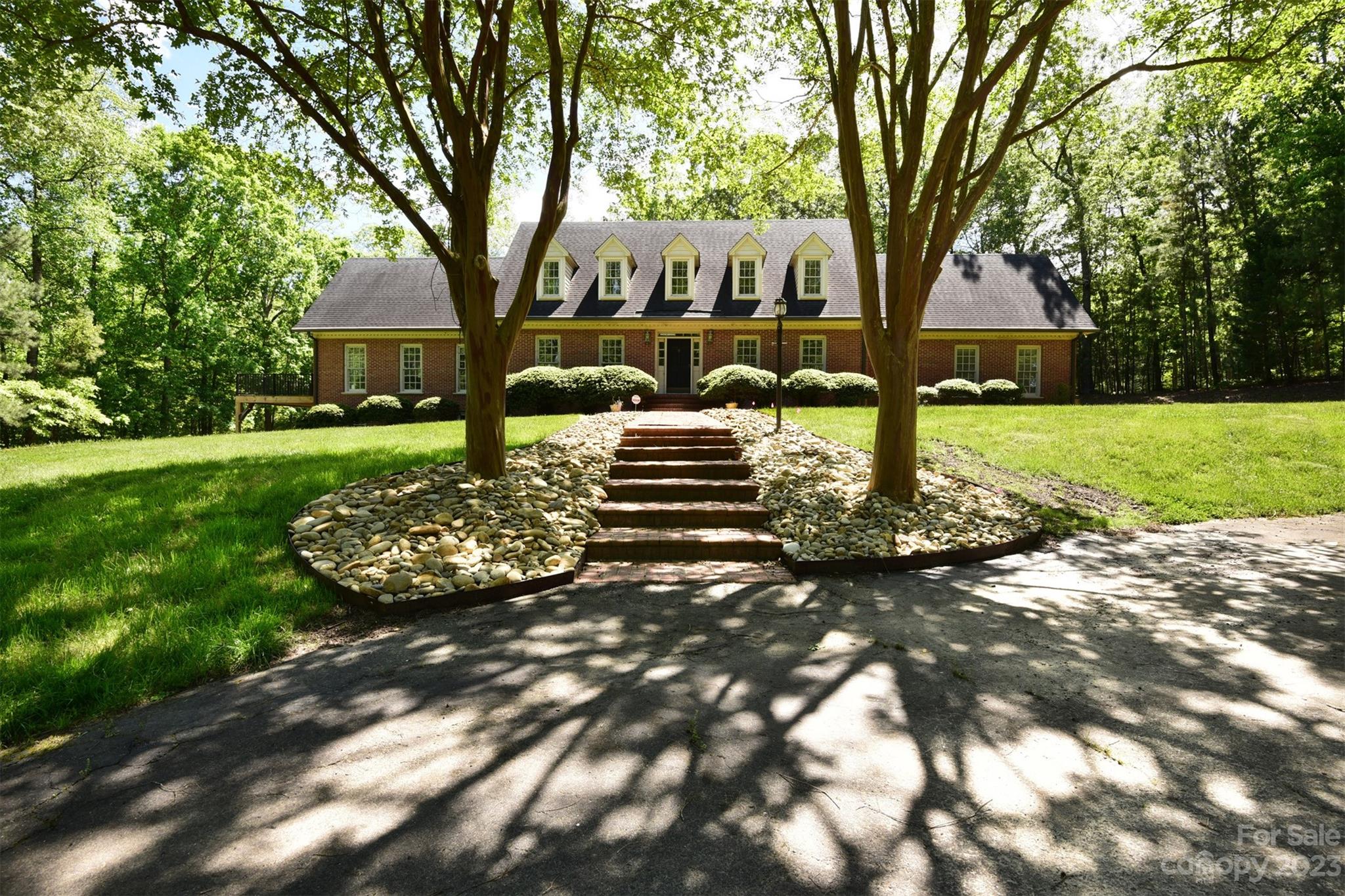 316 Biscoe Road Troy, NC 27371 - Photo 38 of 39 a front view of a house with garden