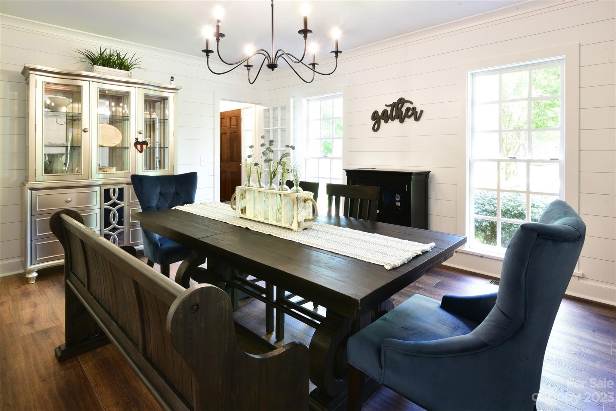 316 Biscoe Road Troy, NC 27371 - Photo 8 of 39 a view of a dining room with furniture window and wooden floor