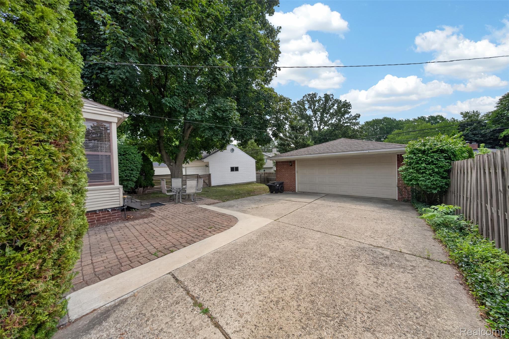 2925 Bembridge Road Royal Oak, MI 48073 - Photo 40 of 44 Driveway wide enough to park a car not to block the garage