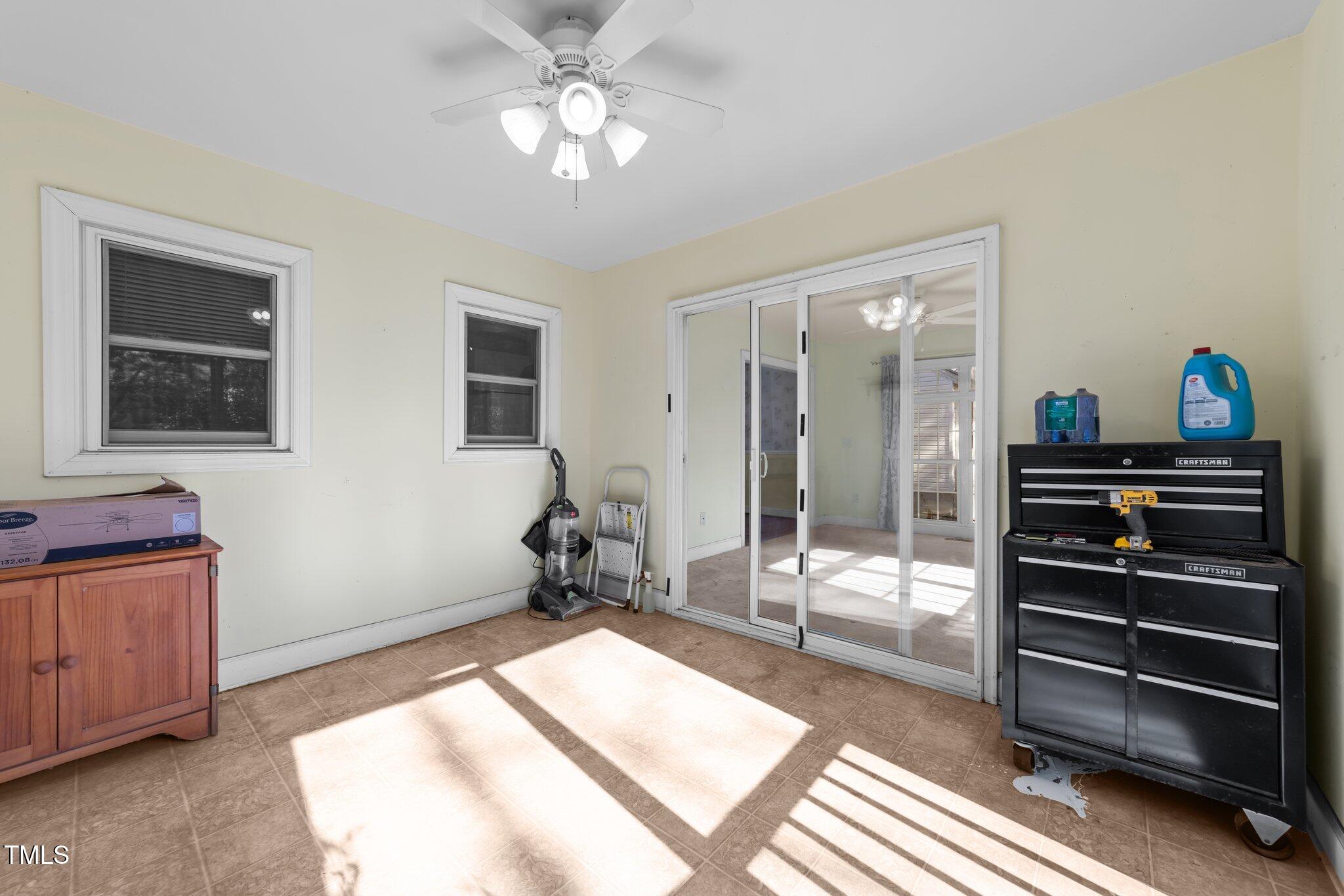 2719 Gordon Street Raleigh, NC 27608 - Photo 27 of 38 Indoor / outdoor living! Let the breeze come through the screen doors that lead out to the deck while enjoying the comforts of indoor life.