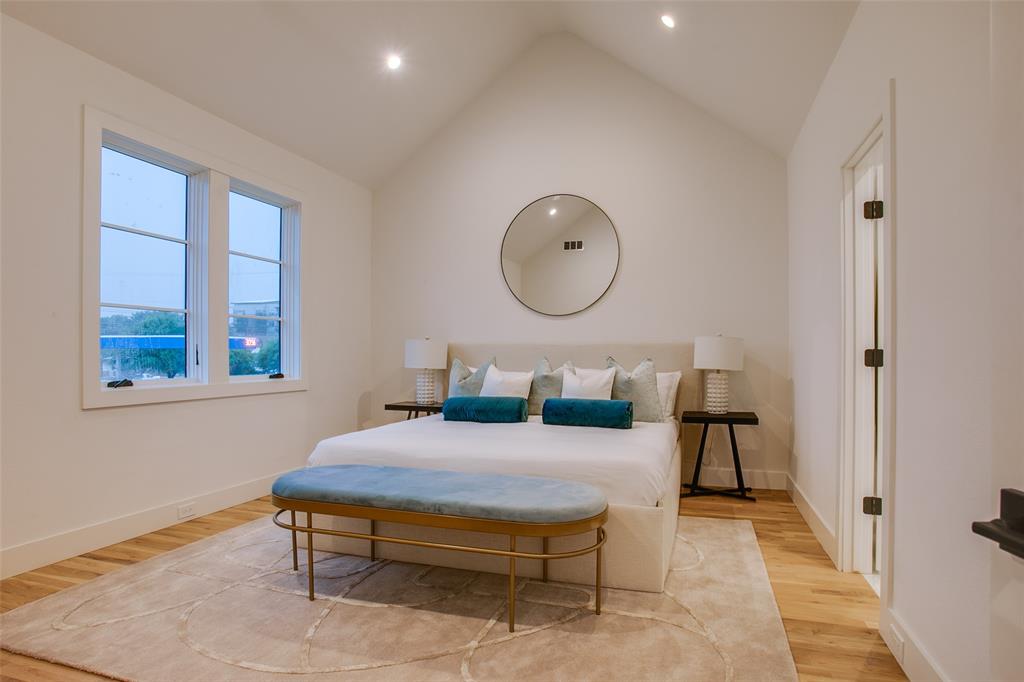7207 Gaston Avenue, Unit 906 Dallas, TX 75214 - Photo 31 of 34 a living room with furniture a window and a potted plant