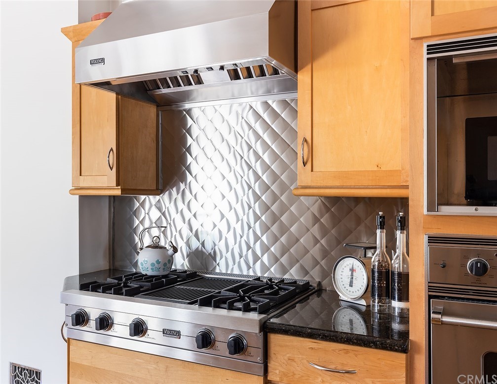 910 East Maple Avenue Orange, CA 92866 - Photo 13 of 38 a close view of a stove top oven