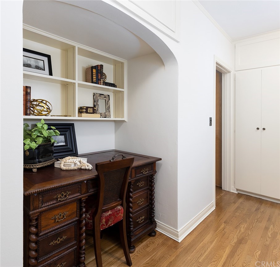 910 East Maple Avenue Orange, CA 92866 - Photo 17 of 38 a dining room with furniture and wooden floor