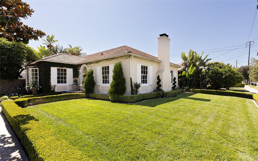 910 East Maple Avenue Orange, CA 92866 - Photo 2 of 38 a view of a house with swimming pool