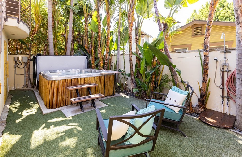 910 East Maple Avenue Orange, CA 92866 - Photo 29 of 38 a view of a chairs and table in backyard