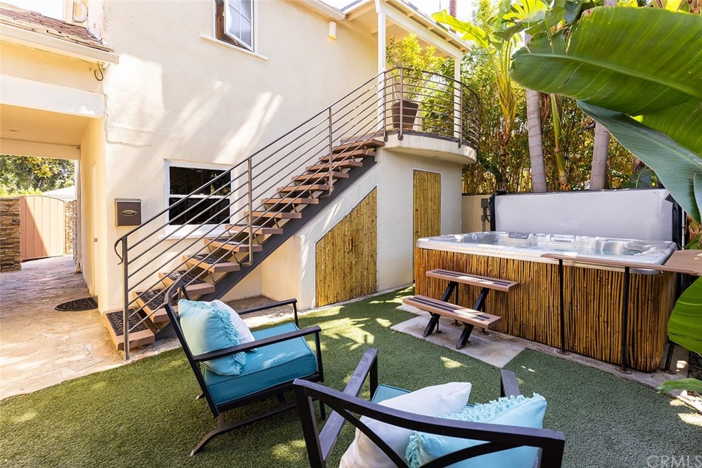 910 East Maple Avenue Orange, CA 92866 - Photo 30 of 38 a balcony with table and chairs