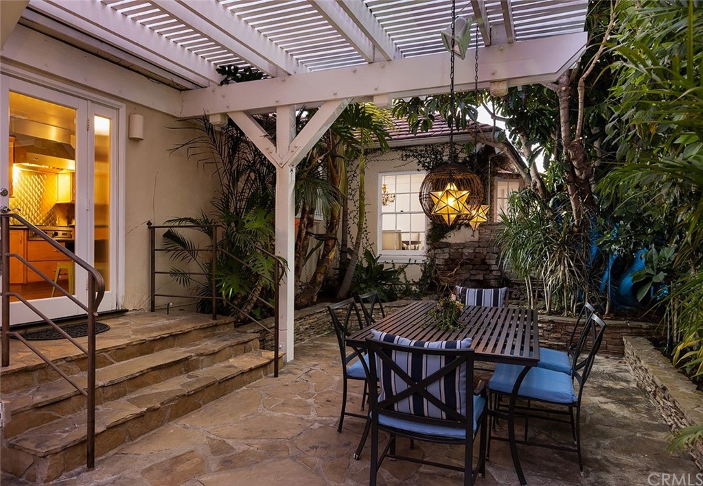 910 East Maple Avenue Orange, CA 92866 - Photo 36 of 38 a view of a chairs and table in a patio