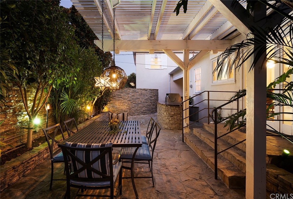 910 East Maple Avenue Orange, CA 92866 - Photo 37 of 38 a view of a chairs and table in the patio