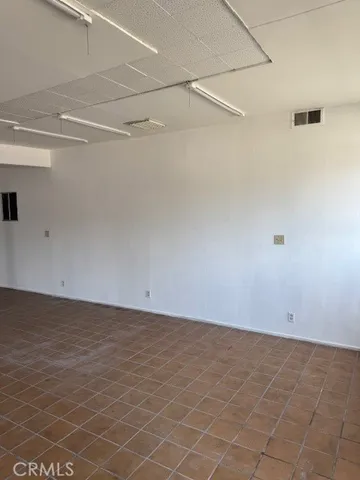 a view of a room with an empty space