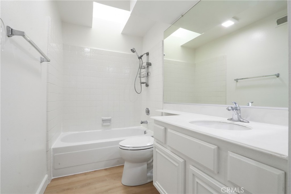 22 Fabriano Irvine, CA 92620 - Photo 17 of 20 a bathroom with a sink a toilet and shower