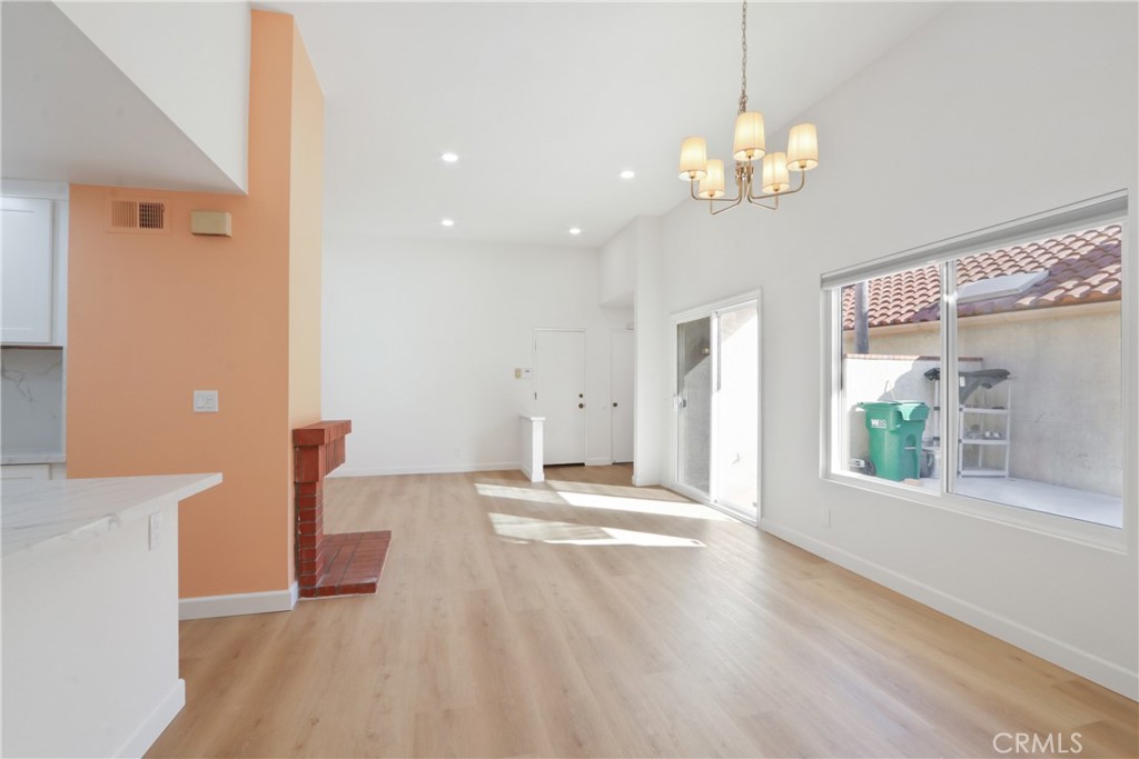 22 Fabriano Irvine, CA 92620 - Photo 9 of 20 a view of a room with wooden floor and windows