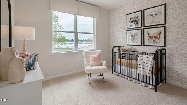 a bed room with a bed and a window