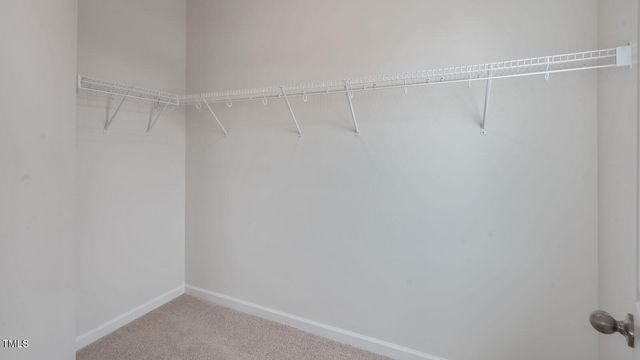 a view of balcony with wooden floor and outdoor seating