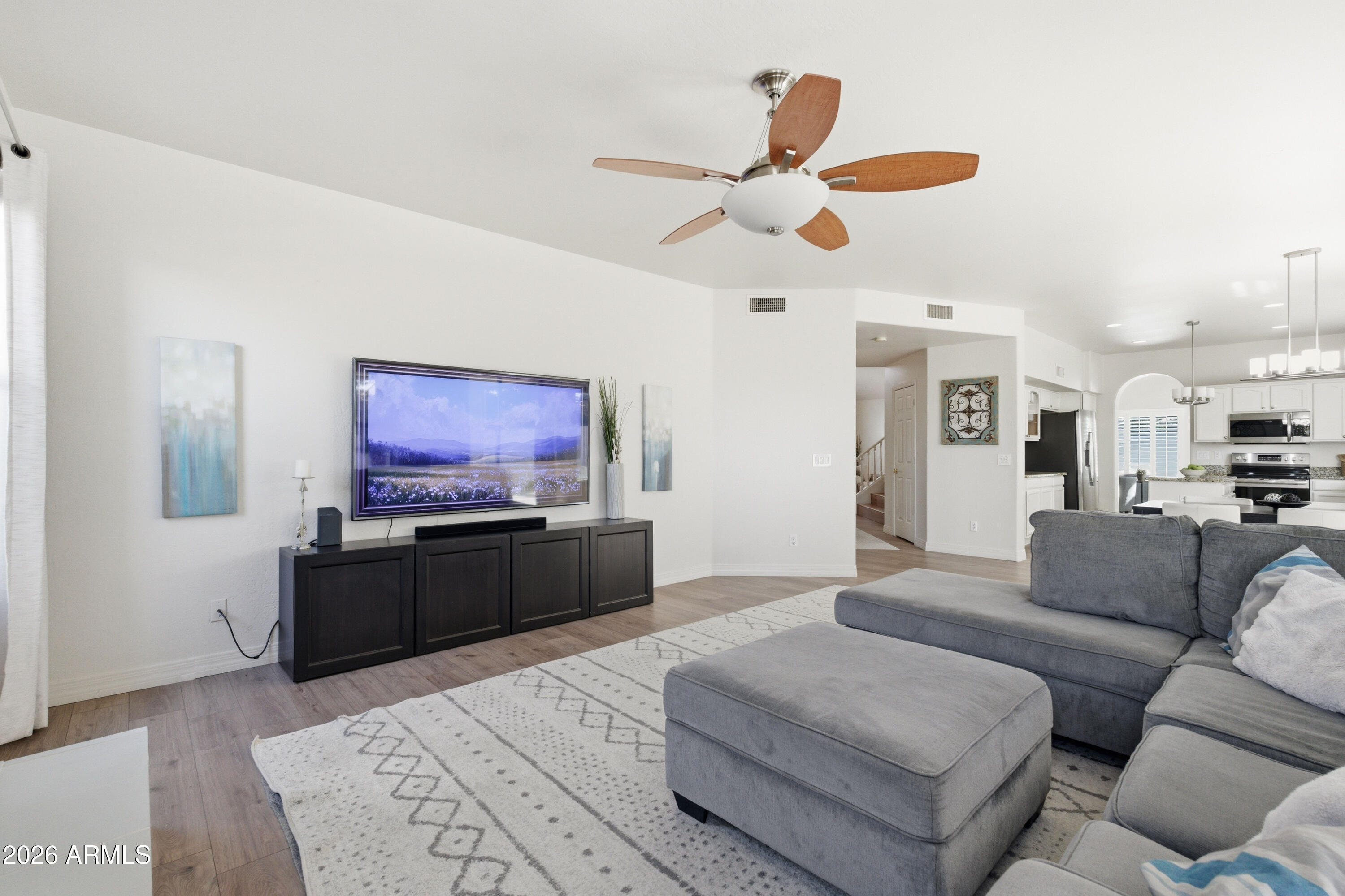 418 South Burk Street Gilbert, AZ 85296 - Photo 29 of 90 a living room with furniture and a flat screen tv