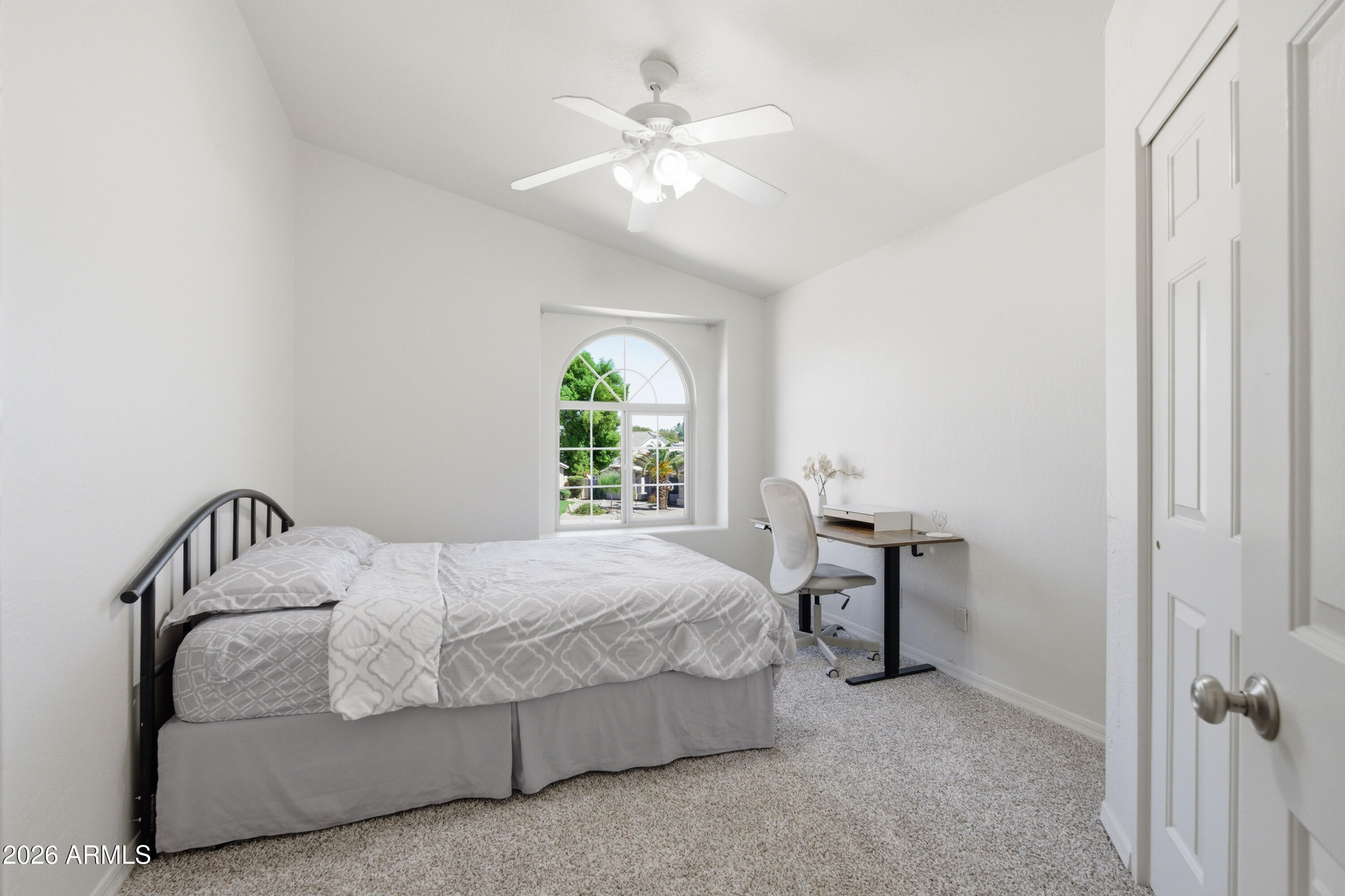 418 South Burk Street Gilbert, AZ 85296 - Photo 49 of 90 a bedroom with a bed and a chandelier