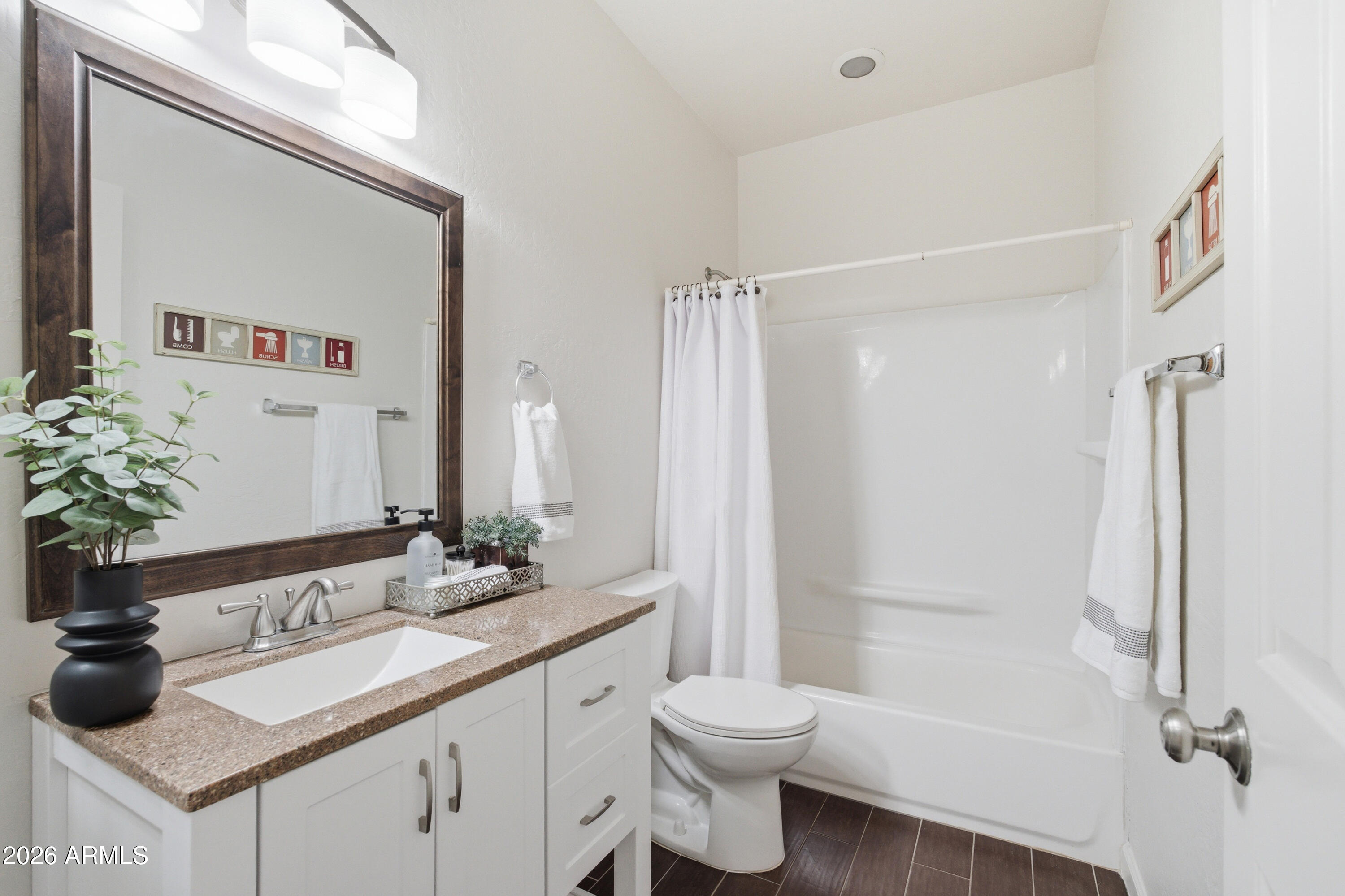 418 South Burk Street Gilbert, AZ 85296 - Photo 51 of 90 a bathroom with a sink toilet and shower