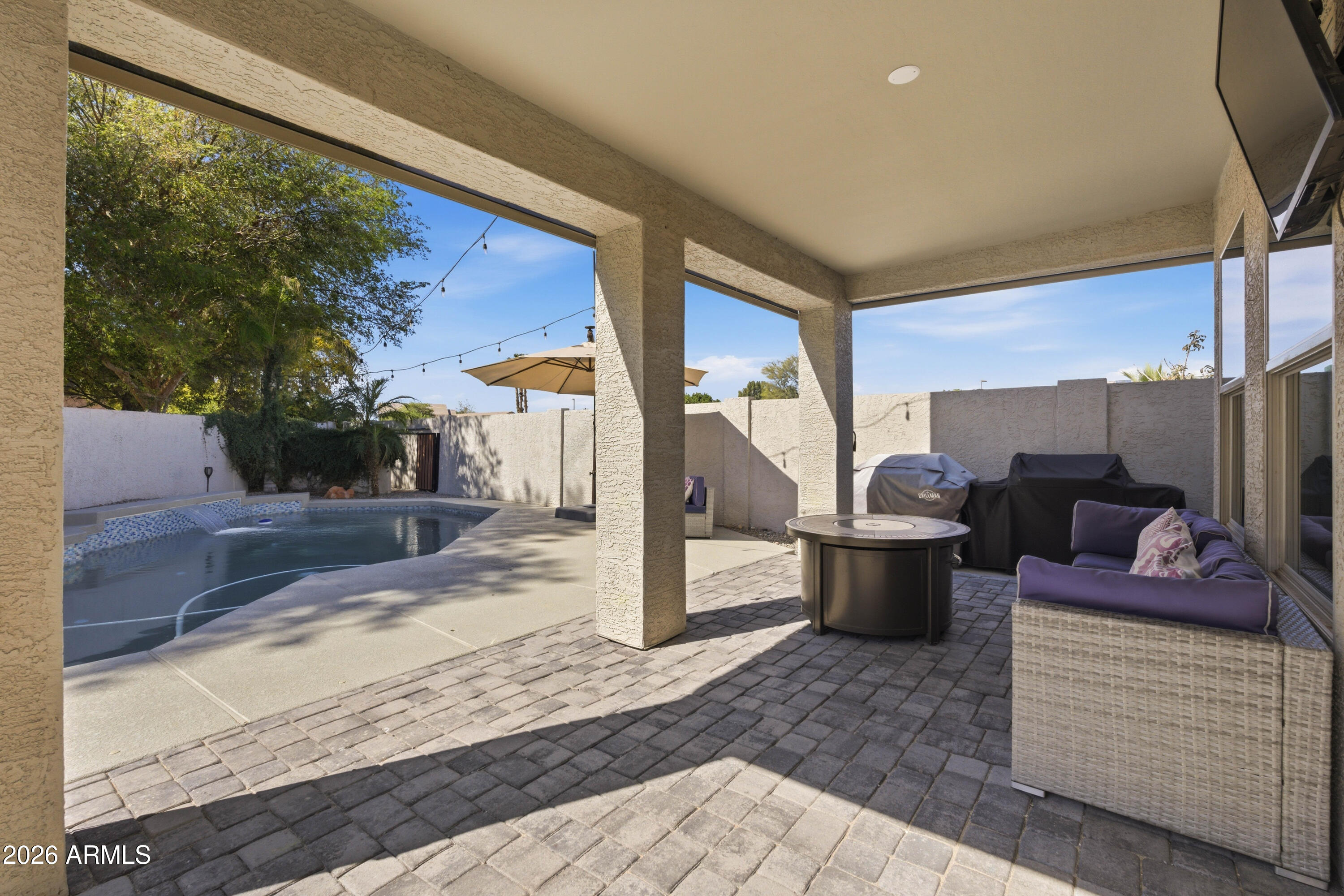 418 South Burk Street Gilbert, AZ 85296 - Photo 57 of 90 a view of living room filled with furniture and a porch