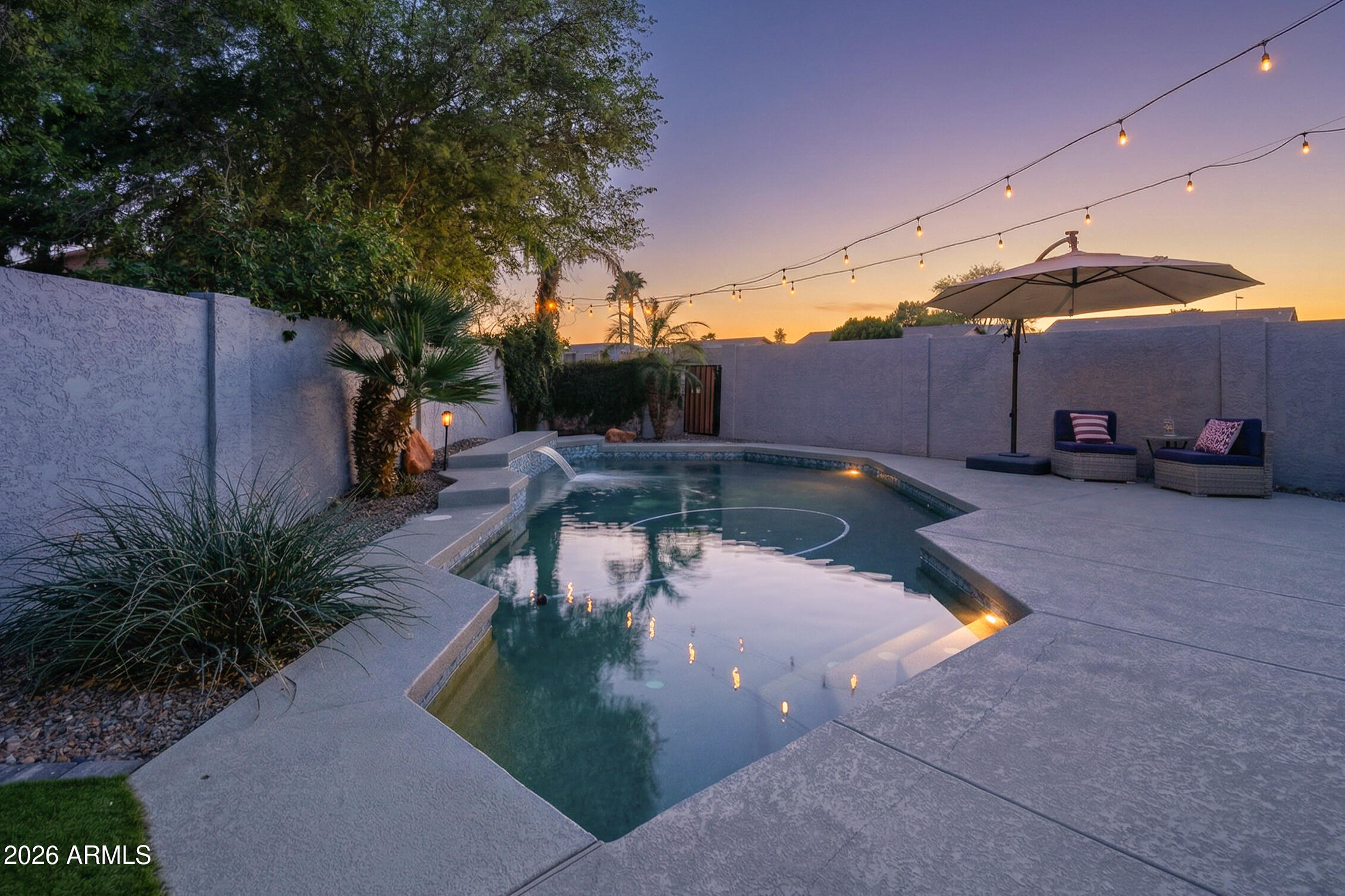418 South Burk Street Gilbert, AZ 85296 - Photo 60 of 90 a view of a swimming pool with a patio