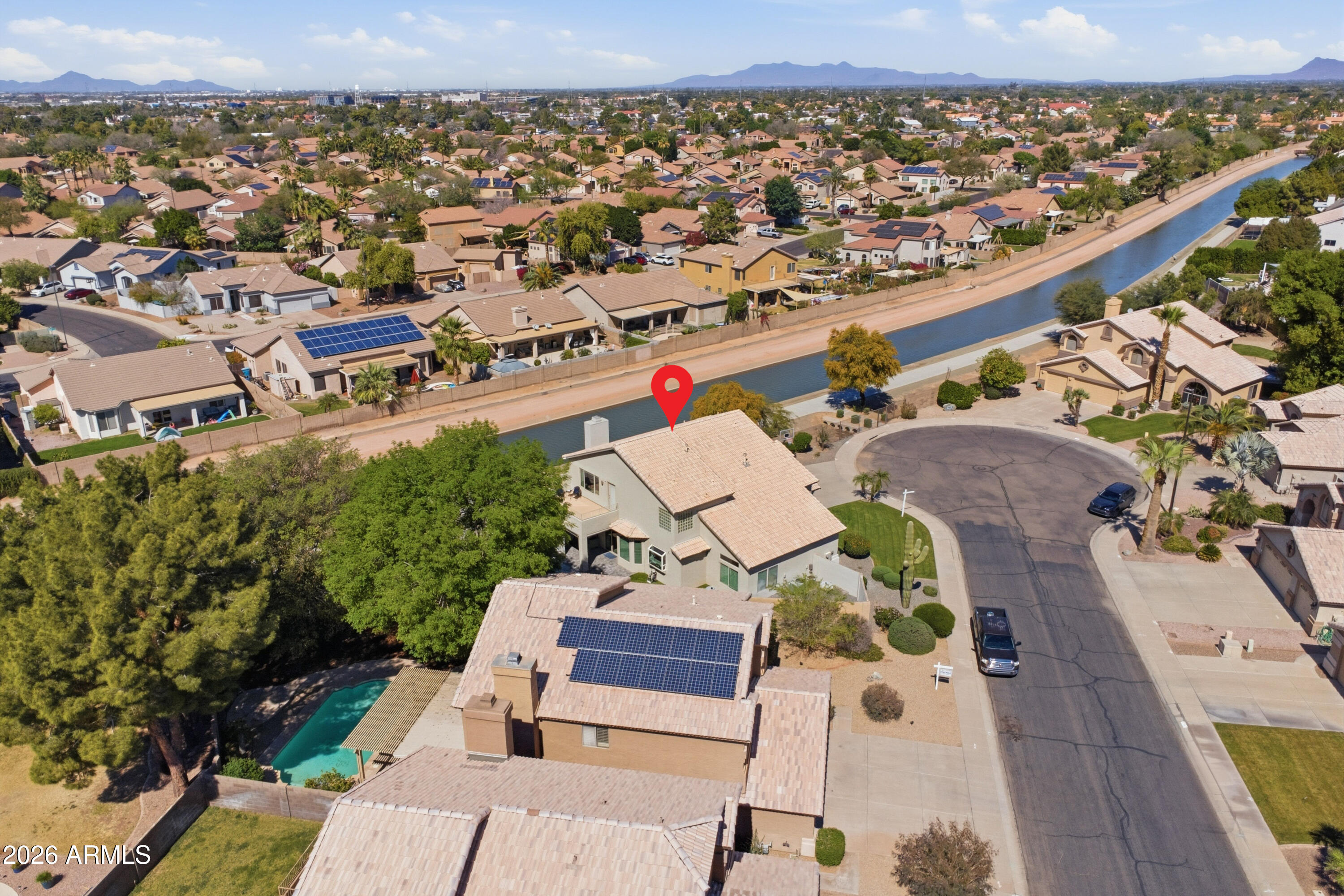 418 South Burk Street Gilbert, AZ 85296 - Photo 77 of 90 an aerial view of a residential houses with outdoor space and trees