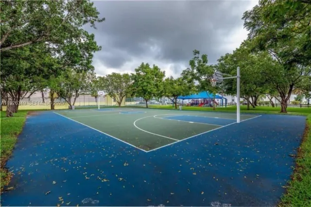 a view of street with tall buildings
