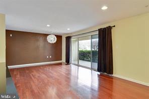 1006 Primrose Road, Unit 103 Annapolis, MD 21403 - Photo 5 of 24 Living room with access to terrace