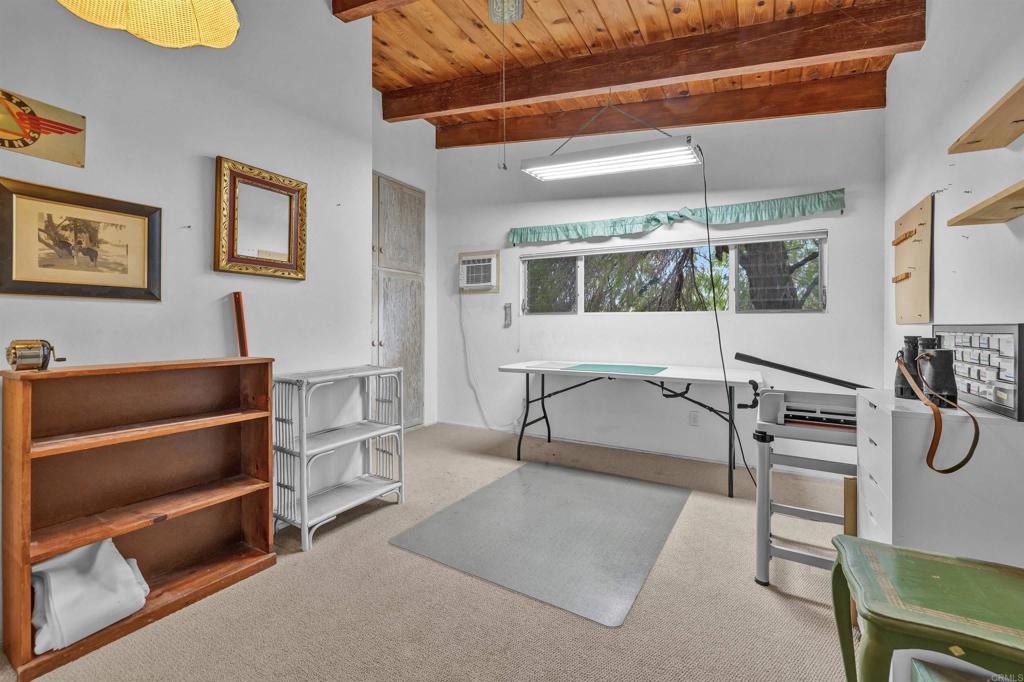 3245 Borrego Springs Road Borrego Springs, CA 92004 - Photo 17 of 25 a living room with furniture a flat screen tv and a table