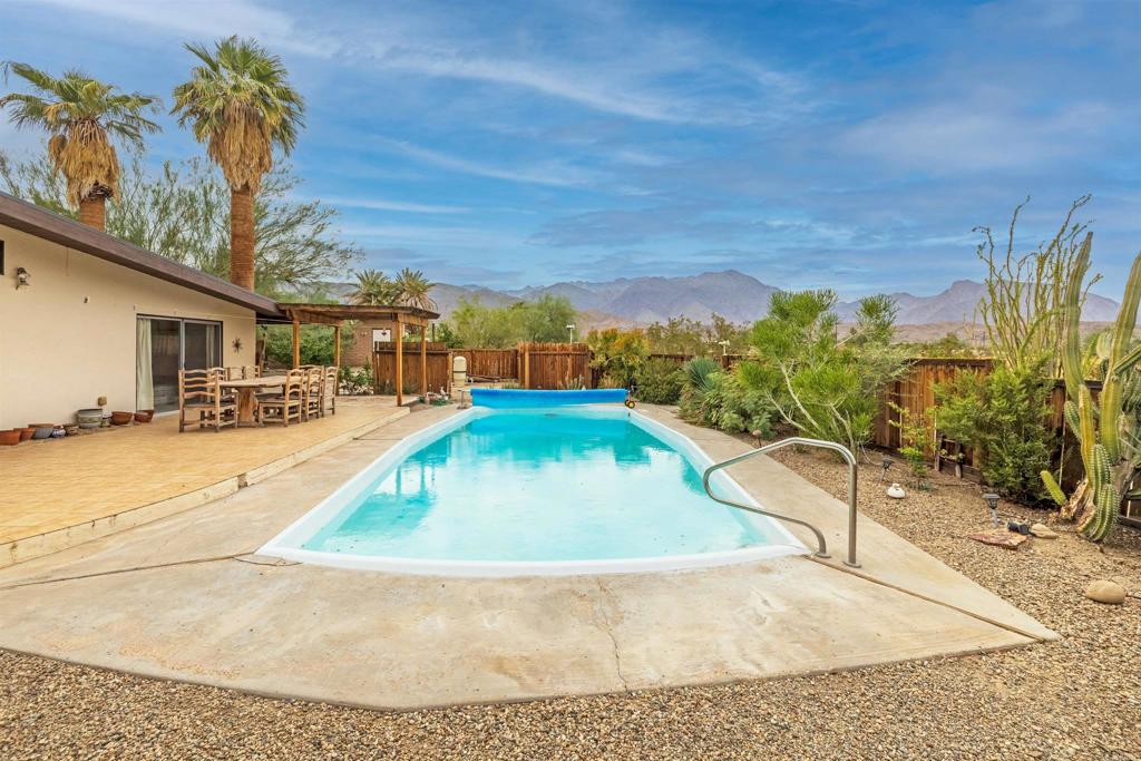 3245 Borrego Springs Road Borrego Springs, CA 92004 - Photo 18 of 25 a view of a swimming pool with a patio