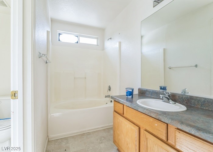 17710 Fairfax Court Reno, NV 89508 - Photo 15 of 19 Full bathroom with shower / tub combination and vanity