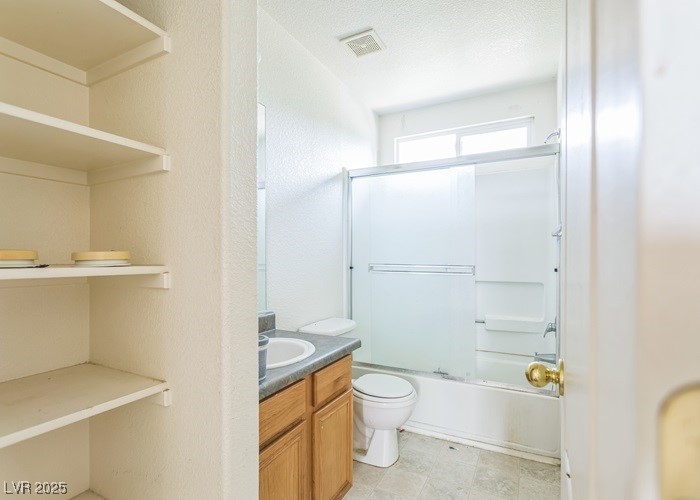 17710 Fairfax Court Reno, NV 89508 - Photo 18 of 19 Bathroom featuring shower / bath combination with glass door and vanity