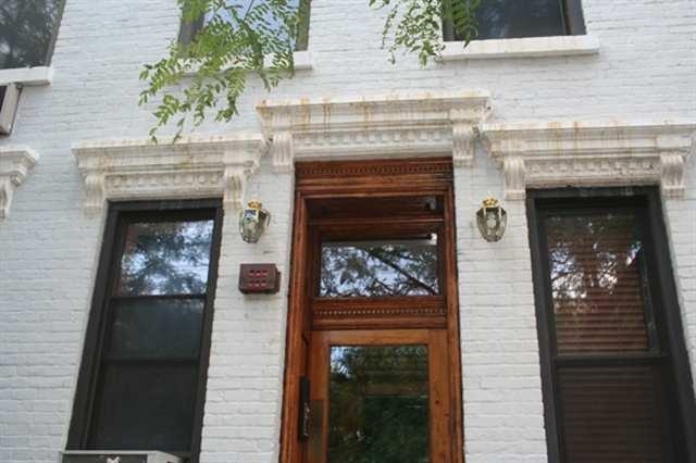 112 Jefferson Street, Unit 2S Hoboken, NJ 07030 - Photo 1 of 1 a view of a livingroom with an empty space and a fireplace