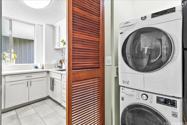 a view of a hallway with washer and dryer