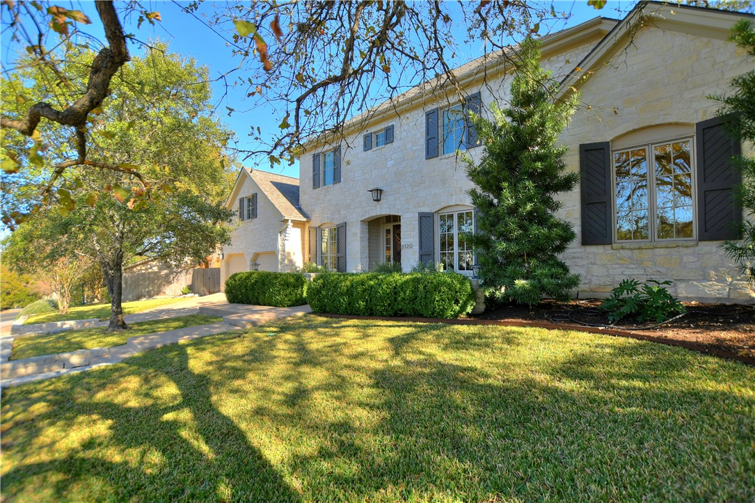 8320 Adirondack Trail Austin, TX 78759 - Photo 1 of 1 a view of a house with a yard