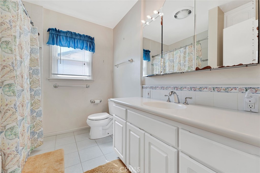 2107 Jolley Drive Burbank, CA 91504 - Photo 24 of 33 a bathroom with a sink a toilet and mirror