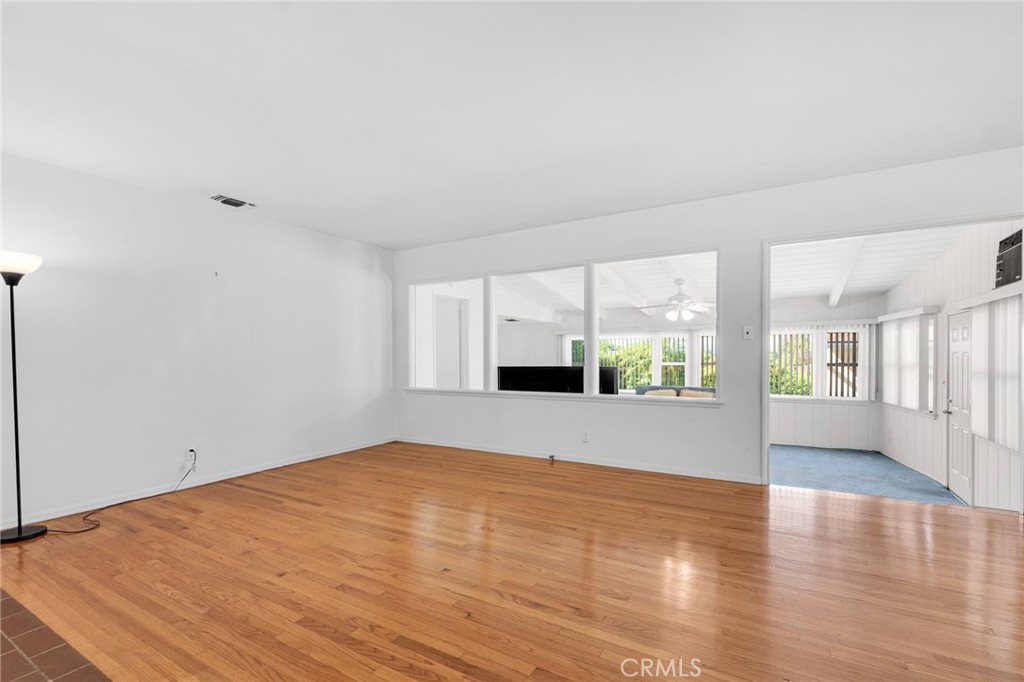 2107 Jolley Drive Burbank, CA 91504 - Photo 5 of 33 a view of empty room with wooden floor and fan