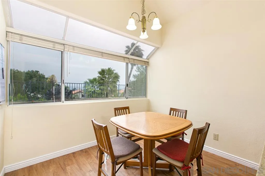 5064 Frazee Road Oceanside, CA 92057 - Photo 13 of 25 a view of a dining room with furniture window and outside view