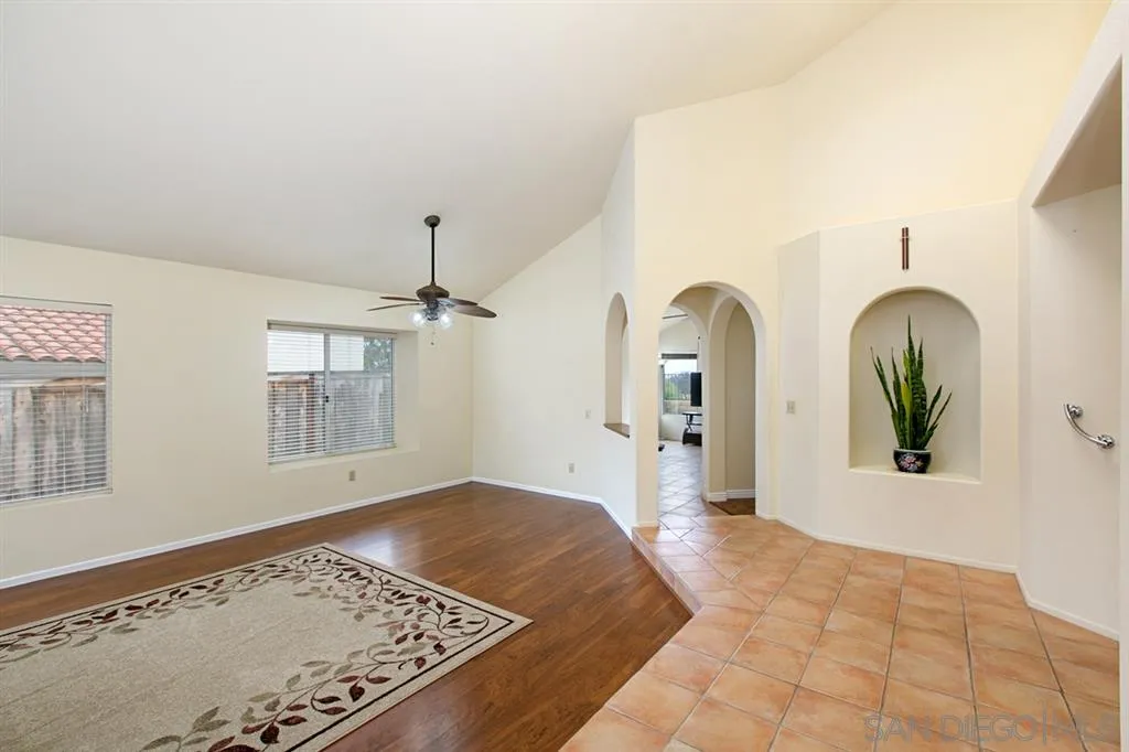 5064 Frazee Road Oceanside, CA 92057 - Photo 4 of 25 a view of an empty room and window